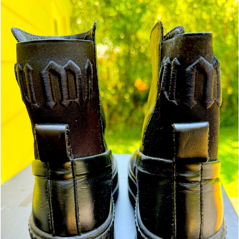 Rihanna Black leather ankle boots. It has Ben gently used